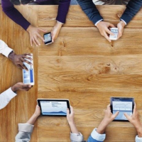 group of people on electronic devices