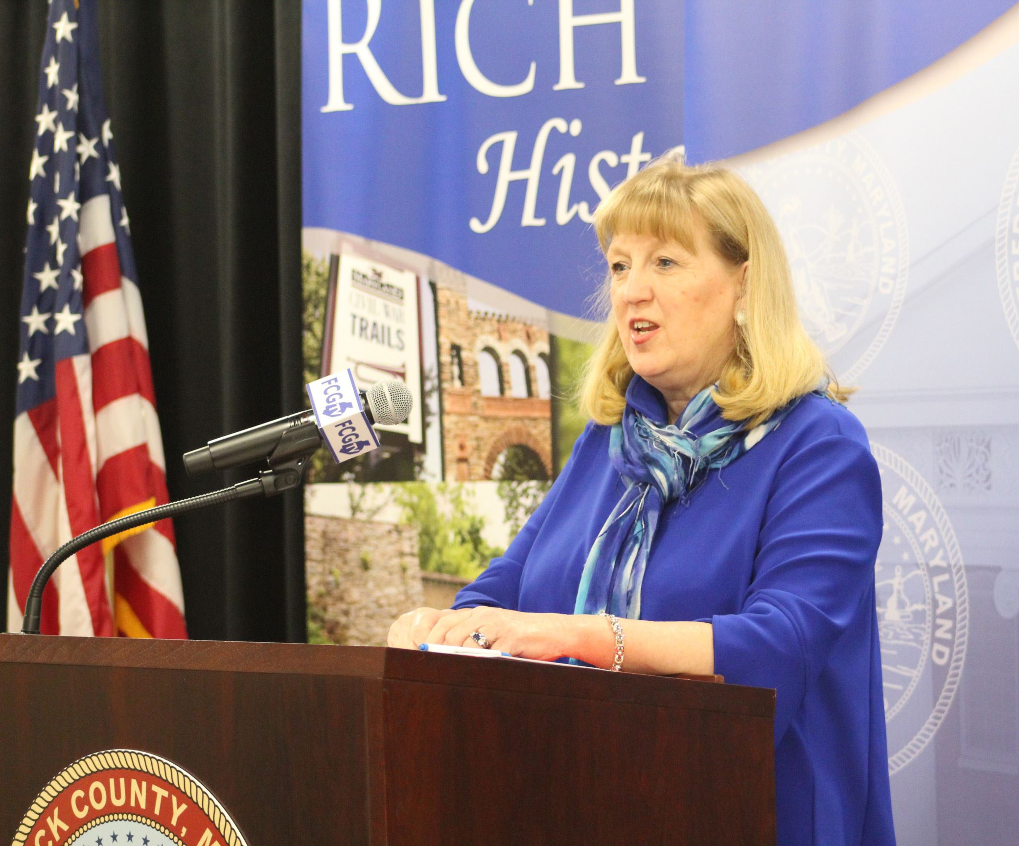 County Executive Jan Gardner at Lectern for Rental Assistance Briefing