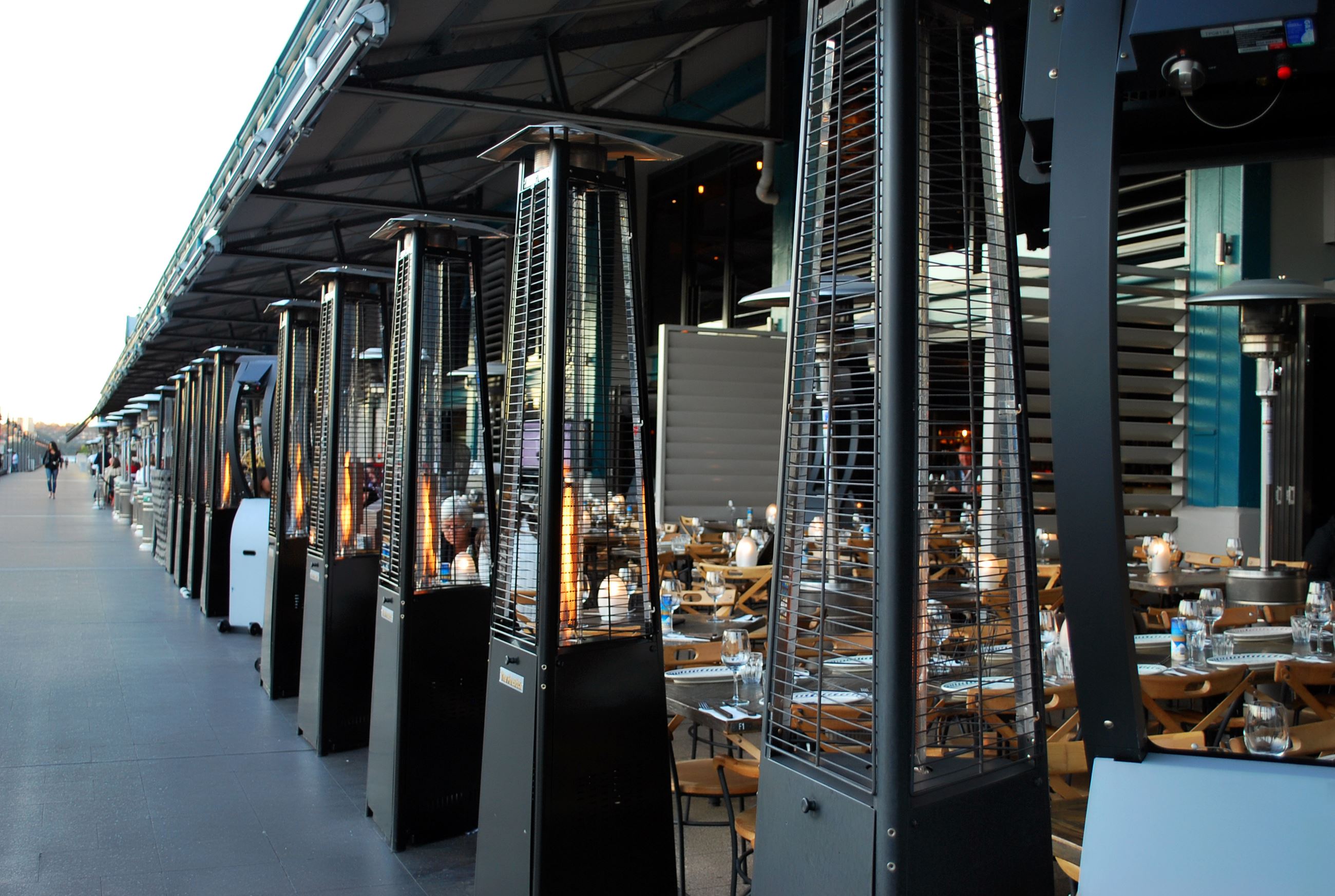 outdoor dining with heaters shutterstock_654764479