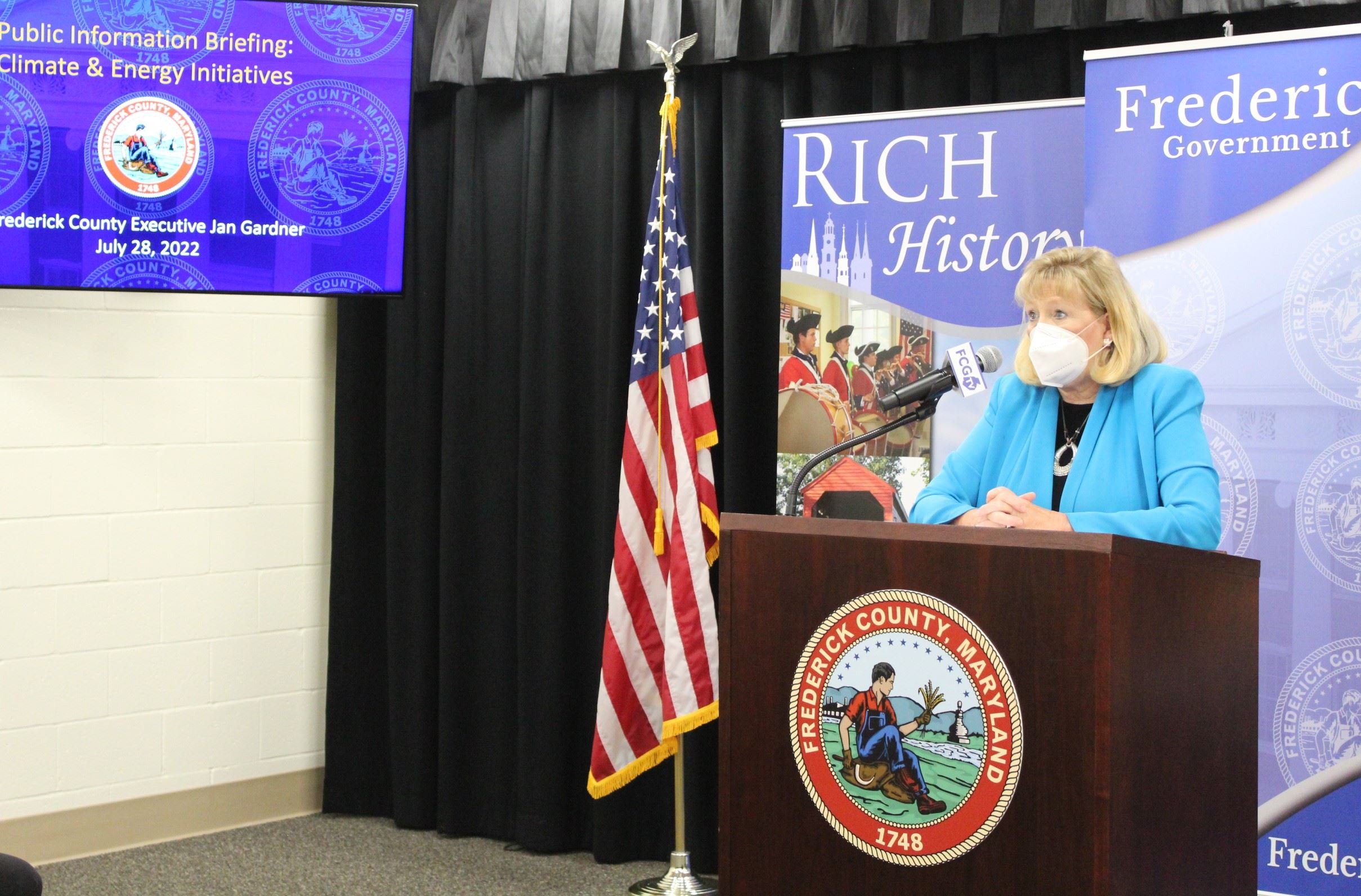 County Executive Jan Gardner stands at a lectern