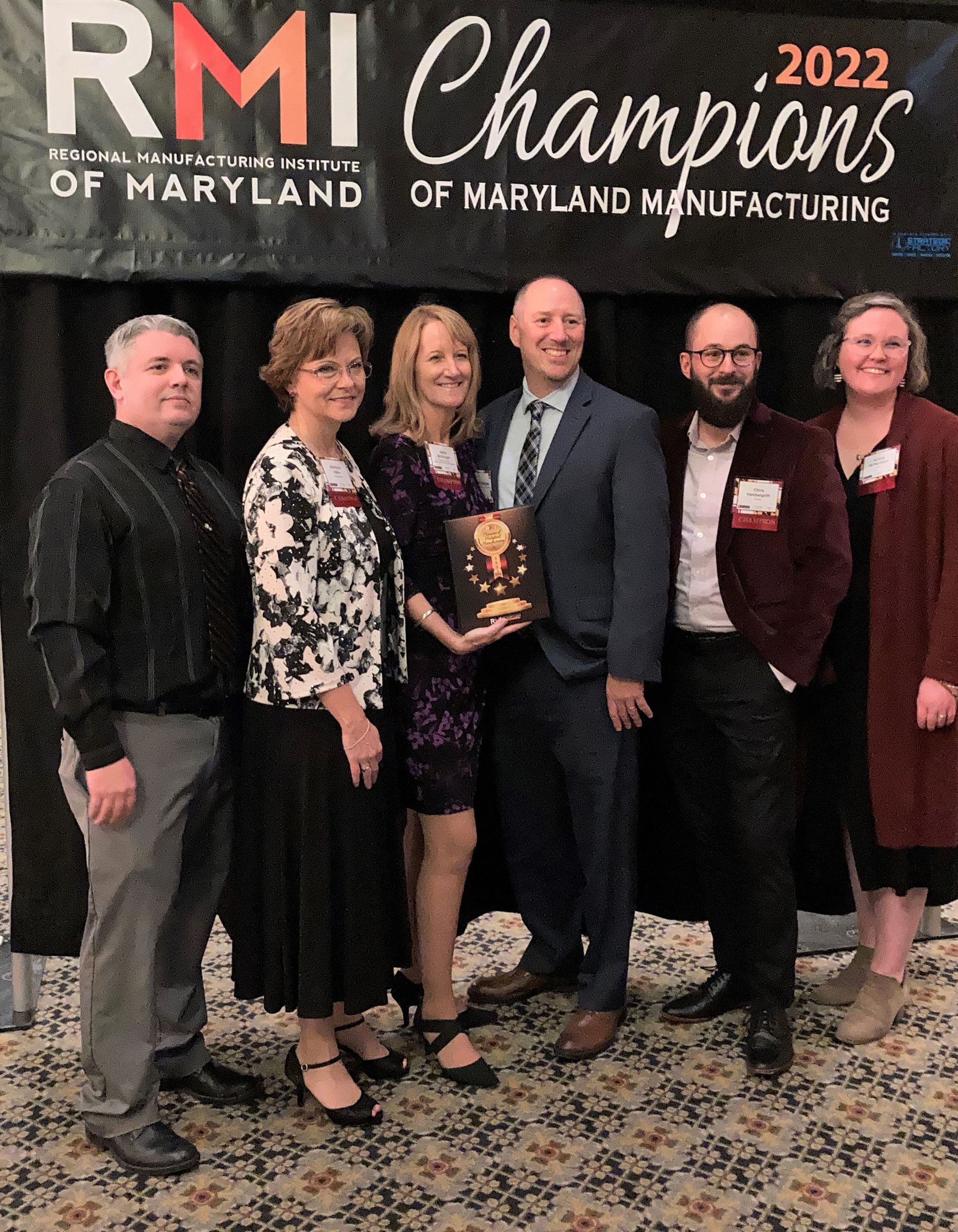 Six people standing inside