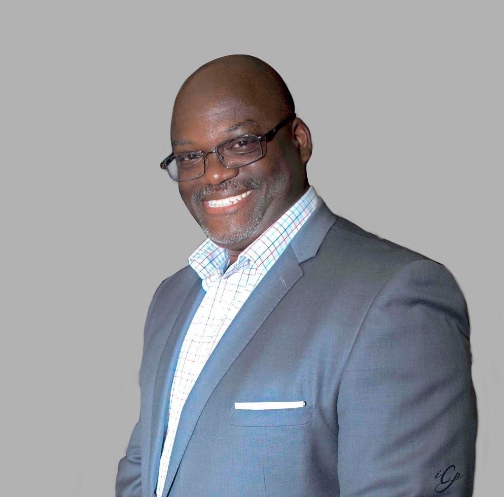 Man with glasses in a suit