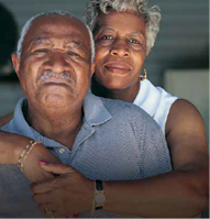 A woman holding a man 