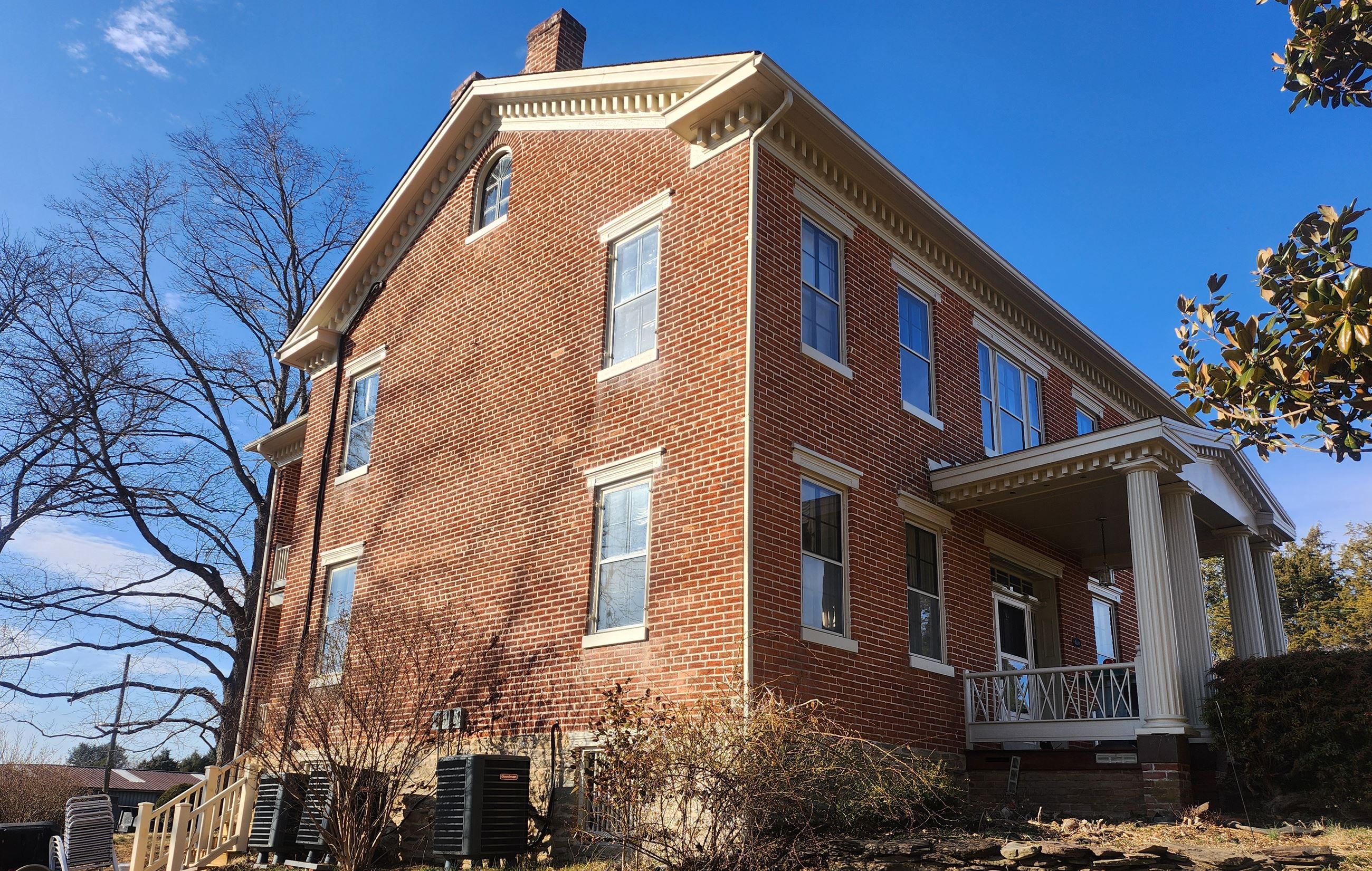 the exterior of a historic brick building