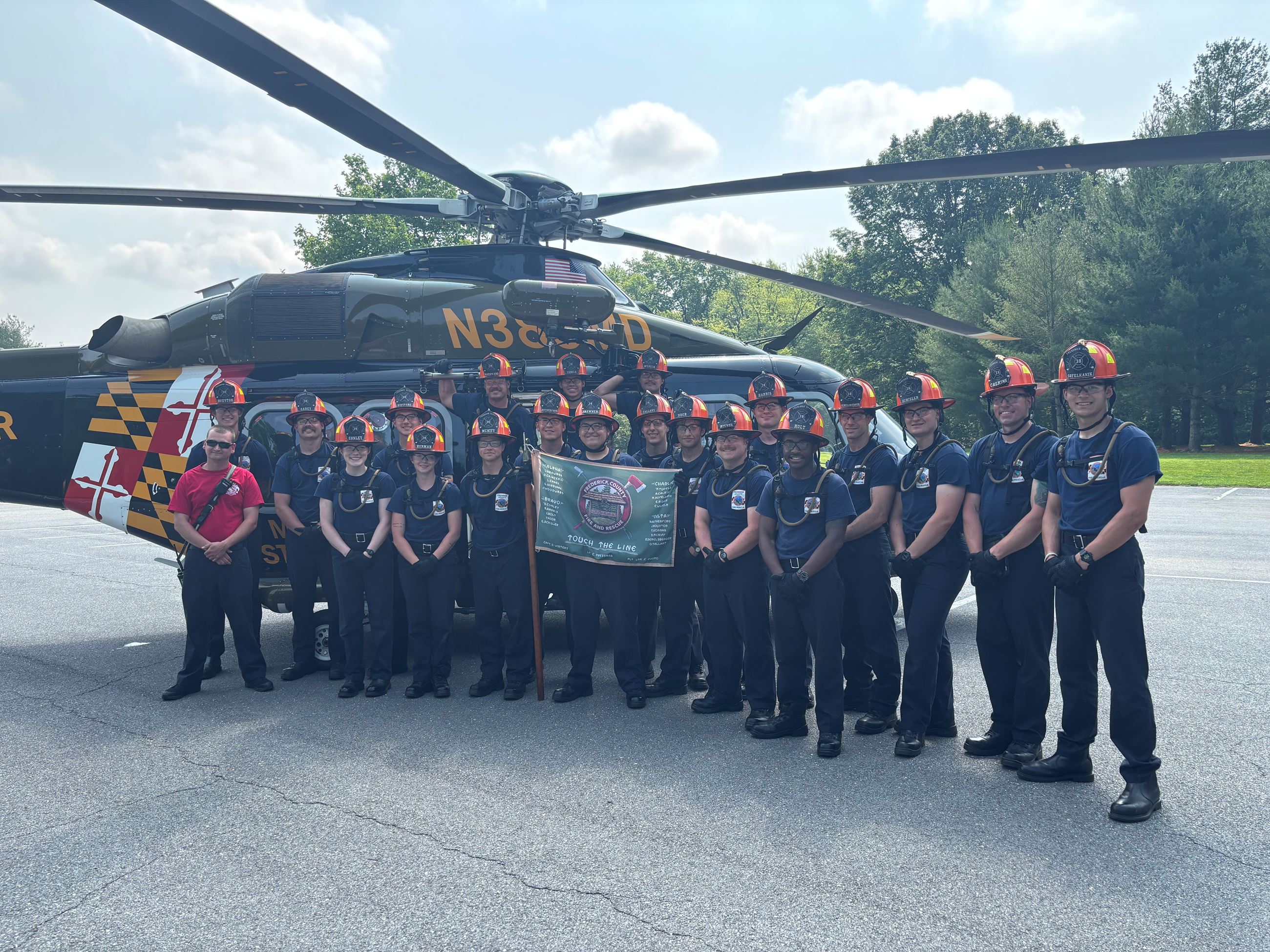 Recruits from Recruit Class 38 standing in from of MSP Trooper 3 